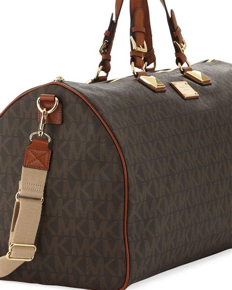 michael kors jet set duffle.